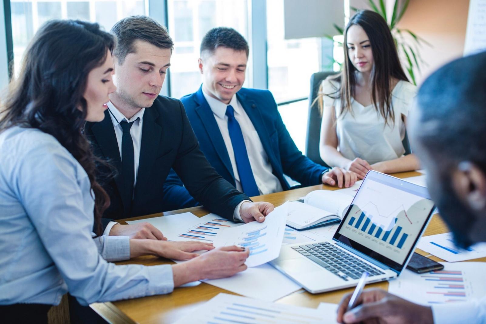 Financial analysis workspace showing budget planning materials and documentation